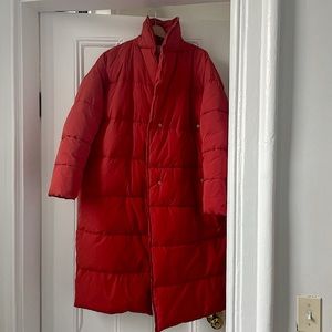 Red puffer coat